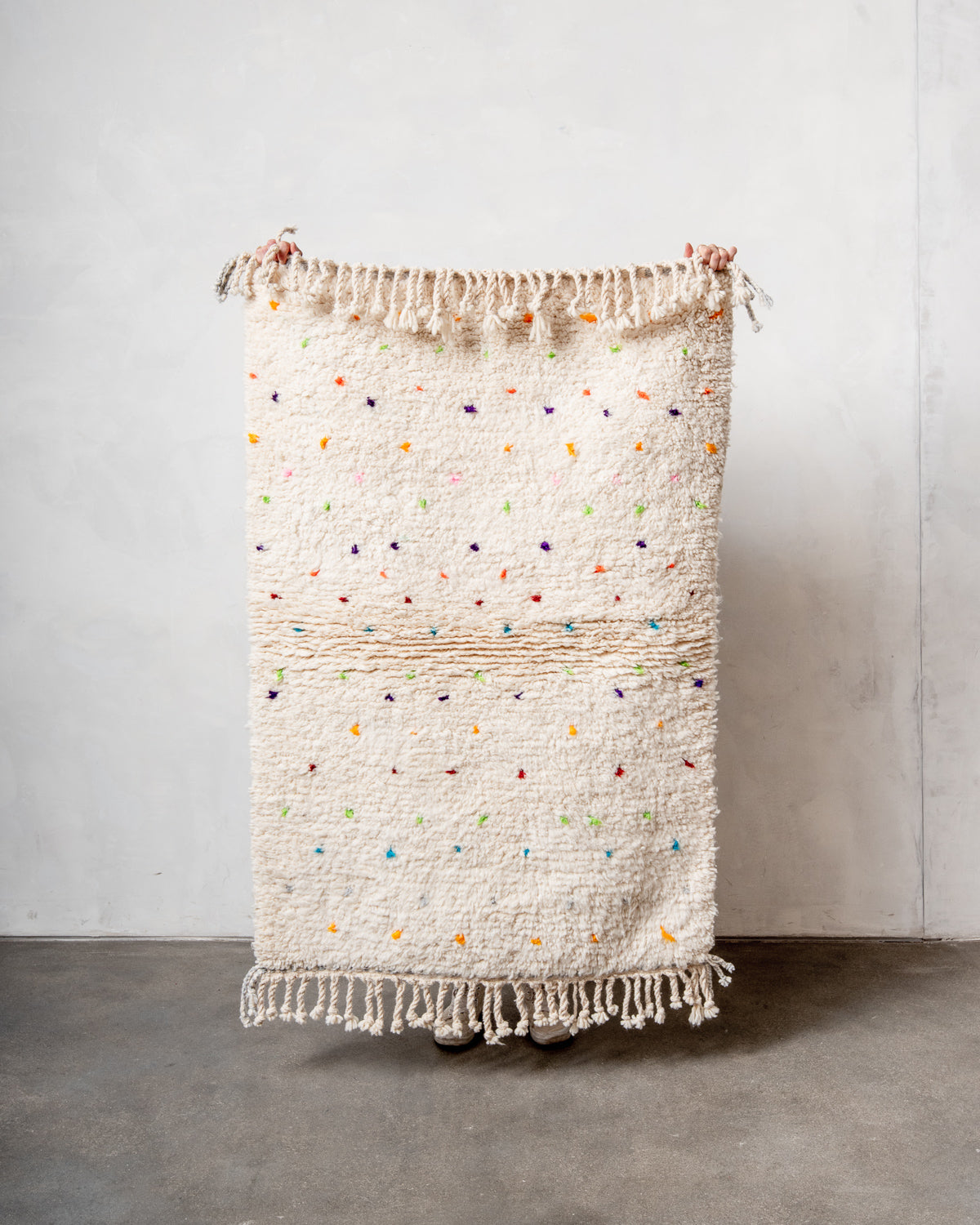 Modern, designer, handcrafted Berber rug from Morocco. Beniourain carpet with beautiful colours and patterns and fluffy wool texture.